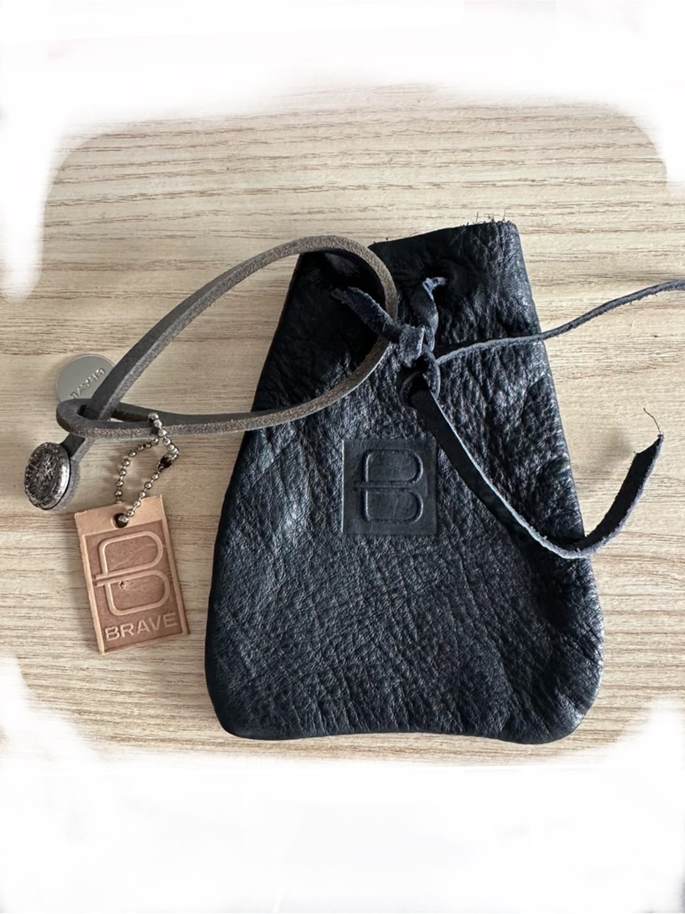 BRAVE Black Leather Mini Drawstring Bag
